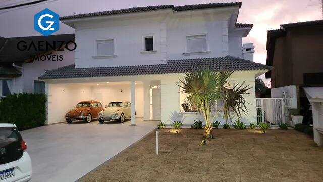 Casa de Condomínio à venda com 4 quartos, 450m² - Foto 1